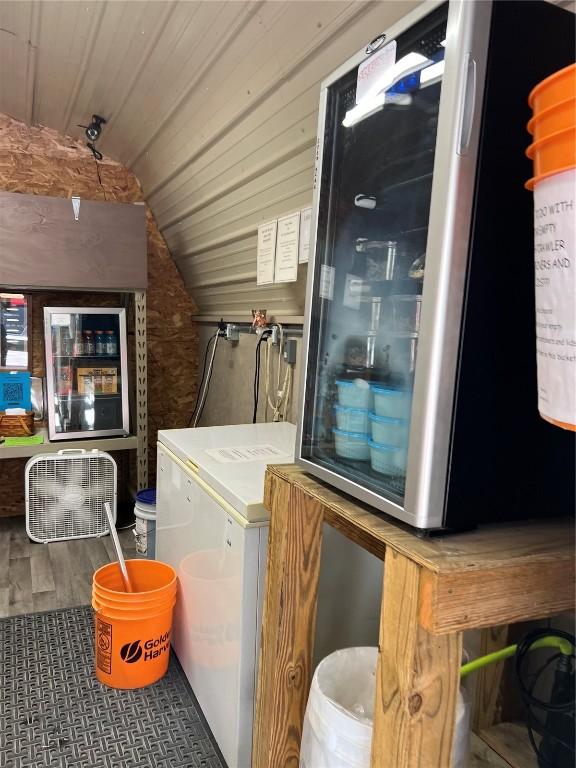101 Canyon Rd, Montezuma, IA 50171 - laundry room with wood finished floors