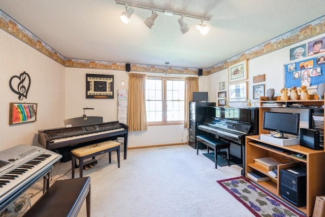 1827 Hamer Dr NW, Cedar Rapids, IA 52405 - living area featuring a textured ceiling, track lighting, and carpet