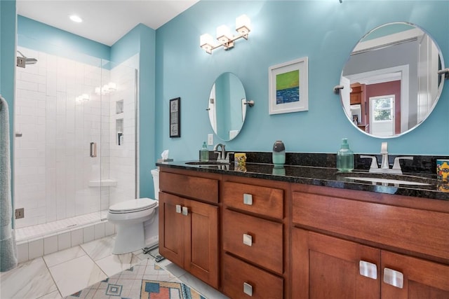1138 Swisher St, Iowa City, IA 52245 - full bathroom featuring double vanity, a stall shower, and recessed lighting