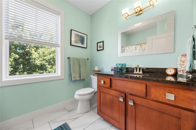 1138 Swisher St, Iowa City, IA 52245 - bathroom featuring vanity and marble finish floors