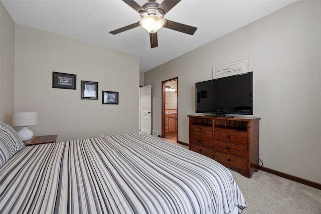2012 Radcliffe Dr SW, Cedar Rapids, IA 52404 - bedroom featuring light colored carpet, ceiling fan, and ensuite bath