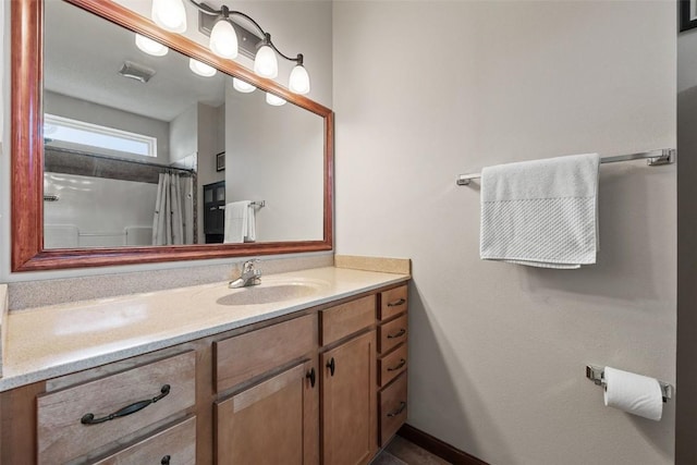 2012 Radcliffe Dr SW, Cedar Rapids, IA 52404 - bathroom featuring vanity and curtained shower