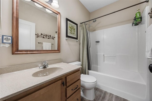 2012 Radcliffe Dr SW, Cedar Rapids, IA 52404 - full bath with vanity, shower / bath combo with shower curtain, and wood finished floors