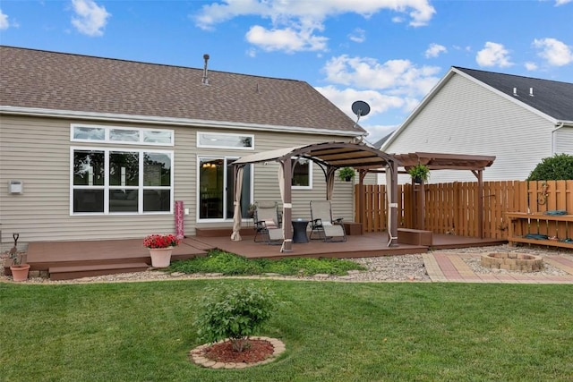 2012 Radcliffe Dr SW, Cedar Rapids, IA 52404 - back of house with a fire pit, a wooden deck, a shingled roof, and a gazebo