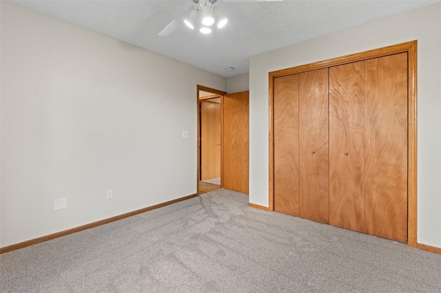 1361 Ozark Rdg, Coralville, IA 52241 - unfurnished bedroom with carpet floors, a closet, and a ceiling fan