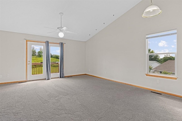 1361 Ozark Rdg, Coralville, IA 52241 - carpeted empty room featuring a ceiling fan, healthy amount of natural light, and vaulted ceiling