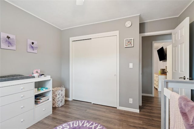 1654 19th St NW, Cedar Rapids, IA 52405 - bedroom with ornamental molding, wood finished floors, and a closet