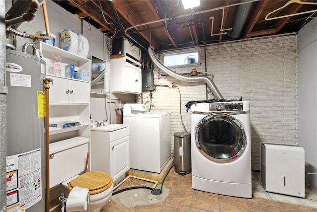 1654 19th St NW, Cedar Rapids, IA 52405 - laundry room featuring water heater and separate washer and dryer
