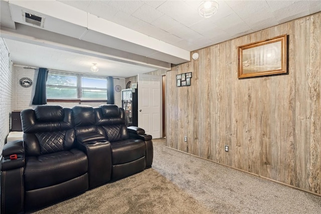 1654 19th St NW, Cedar Rapids, IA 52405 - carpeted living room featuring wooden walls and baseboards