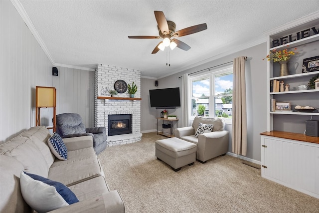 364 Essex Dr NE, Cedar Rapids, IA 52402 - living area featuring ornamental molding, a ceiling fan, a textured ceiling, light carpet, and a brick fireplace