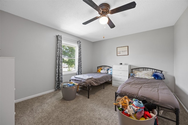 364 Essex Dr NE, Cedar Rapids, IA 52402 - carpeted bedroom with a textured ceiling and a ceiling fan