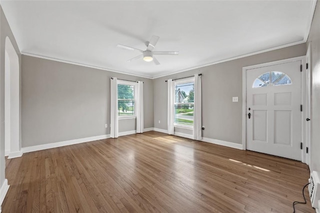 2500 D Ave NE, Cedar Rapids, IA 52402 - foyer entrance featuring crown molding, wood finished floors, and ceiling fan