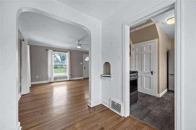 2500 D Ave NE, Cedar Rapids, IA 52402 - corridor featuring wood finished floors and arched walkways