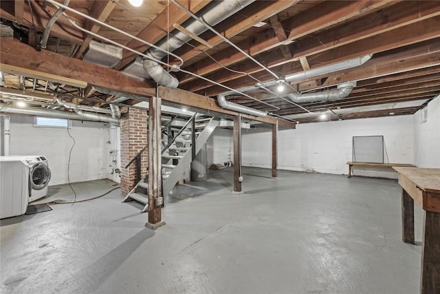 2500 D Ave NE, Cedar Rapids, IA 52402 - below grade area featuring washing machine and dryer and stairs
