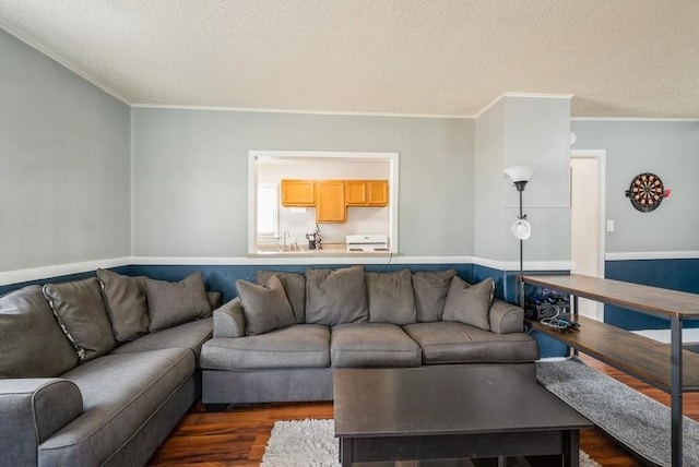3825 Hart Ct, Cedar Rapids, IA 52402 - living area featuring a textured ceiling, dark wood-style floors, and ornamental molding