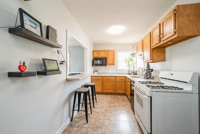 3825 Hart Ct, Cedar Rapids, IA 52402 - kitchen with white range with gas cooktop, black microwave, light countertops, and dishwashing machine