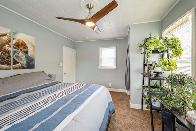 3825 Hart Ct, Cedar Rapids, IA 52402 - carpeted bedroom with ornamental molding and ceiling fan