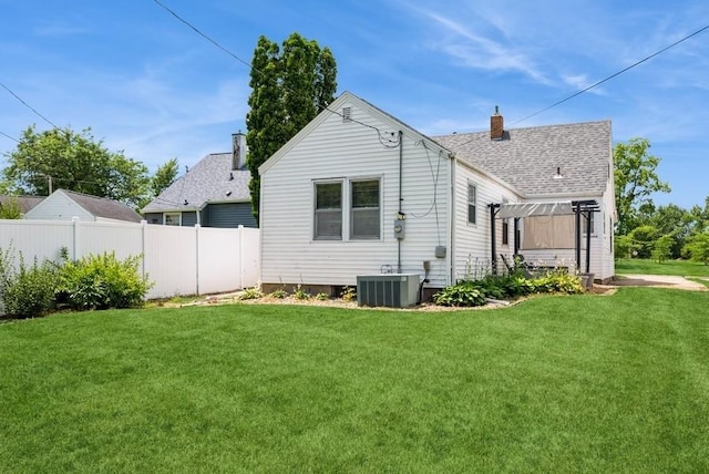 3825 Hart Ct, Cedar Rapids, IA 52402 - rear view of house with a chimney, a pergola, and a shingled roof