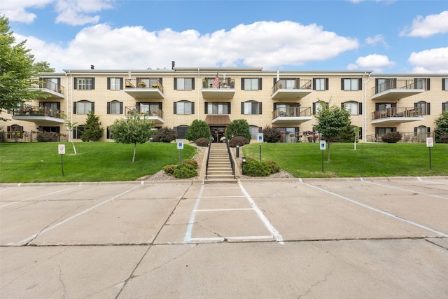 2131 1st Ave Unit 108, Cedar Rapids, IA 52402 - view of apartment building / complex with uncovered parking
