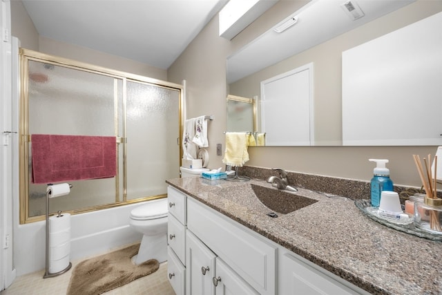 2131 1st Ave Unit 108, Cedar Rapids, IA 52402 - bathroom with vanity and bath / shower combo with glass door