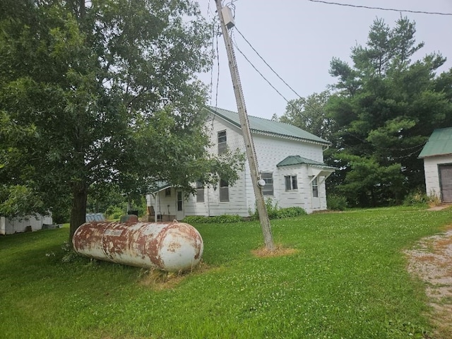2142 310th Ave, Chelsea, IA 52215 - view of property exterior featuring a yard