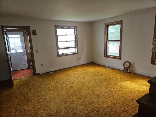 2142 310th Ave, Chelsea, IA 52215 - unfurnished living room with carpet flooring