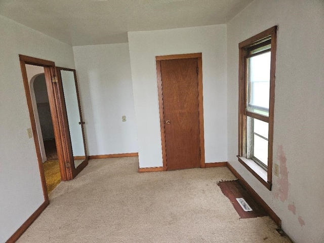 2142 310th Ave, Chelsea, IA 52215 - empty room with light colored carpet and baseboards