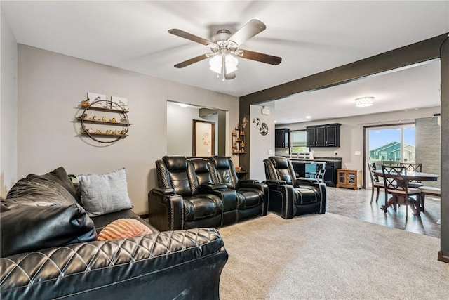 2908 Riviera St SW Unit B, Cedar Rapids, IA 52404 - living room with a ceiling fan and carpet floors