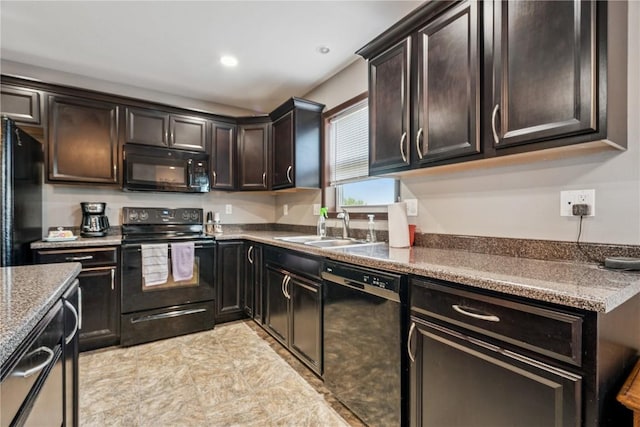 2908 Riviera St SW Unit B, Cedar Rapids, IA 52404 - kitchen featuring black appliances, dark brown cabinetry, recessed lighting, and dark stone counters