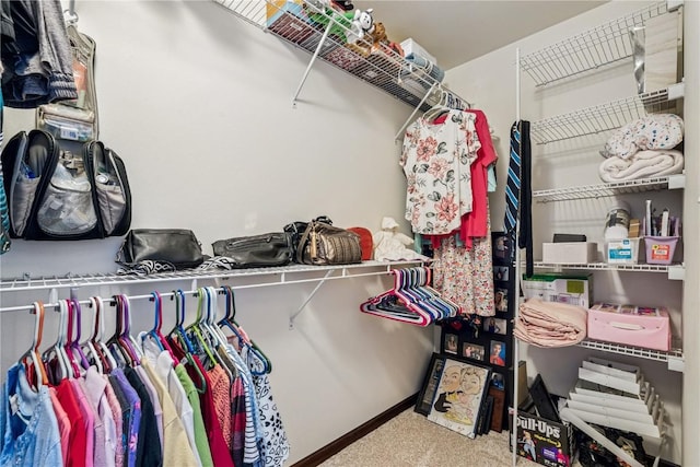 2908 Riviera St SW Unit B, Cedar Rapids, IA 52404 - walk in closet featuring carpet flooring