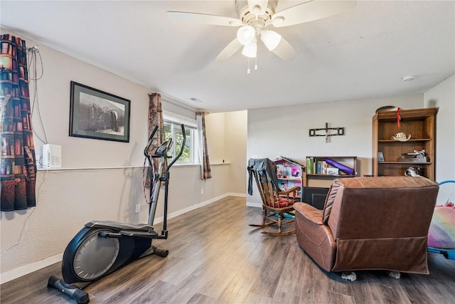 2908 Riviera St SW Unit B, Cedar Rapids, IA 52404 - living area featuring wood finished floors and a ceiling fan