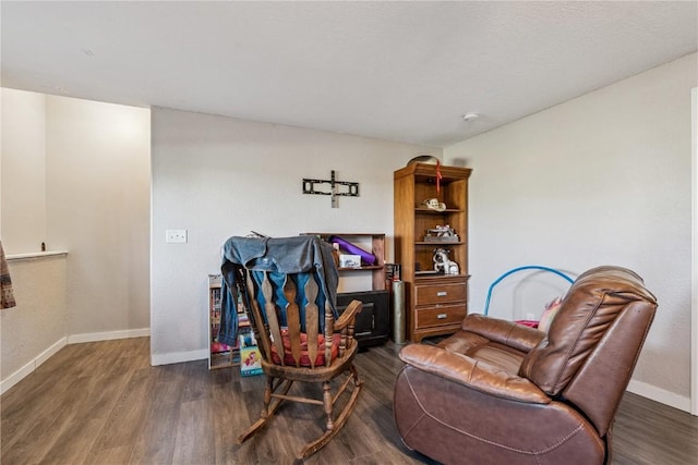 2908 Riviera St SW Unit B, Cedar Rapids, IA 52404 - living area featuring baseboards and wood finished floors