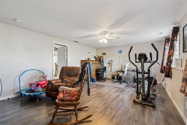 2908 Riviera St SW Unit B, Cedar Rapids, IA 52404 - exercise area with wood finished floors and ceiling fan