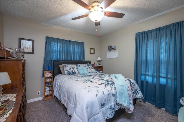 1305 E Ave, Vinton, IA 52349 - carpeted bedroom with ceiling fan and a textured ceiling