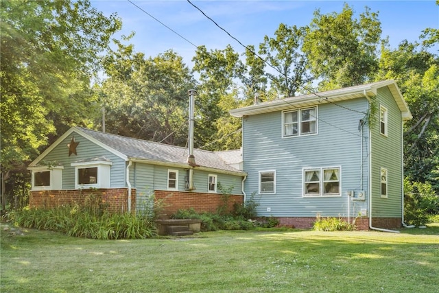 10205 Feather Ridge Rd, Toddville, IA 52341 - back of house with a yard