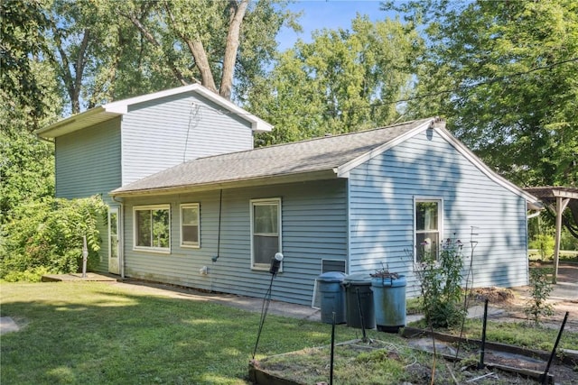 10205 Feather Ridge Rd, Toddville, IA 52341 - view of side of home with a lawn