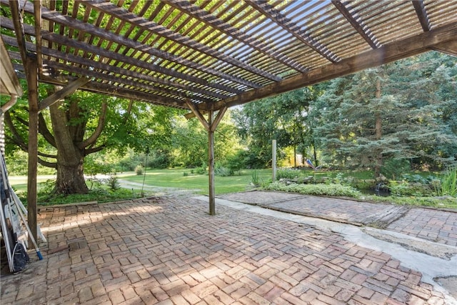 10205 Feather Ridge Rd, Toddville, IA 52341 - view of patio with a pergola and view of scattered trees