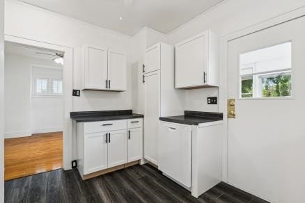 3107 E Ave NE, Cedar Rapids, IA 52402 - kitchen with dark countertops, healthy amount of natural light, and dark wood-type flooring