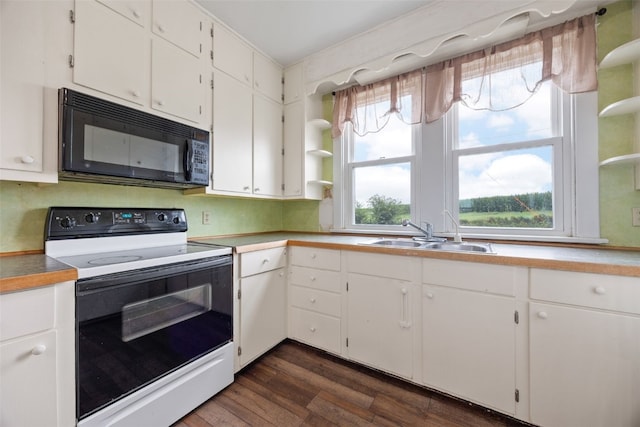 899 Jackson Ave, Mechanicsville, IA 52306 - kitchen with white electric range oven, black microwave, dark wood-type flooring, open shelves, and white cabinets