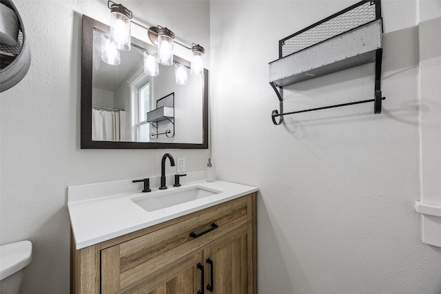 899 Jackson Ave, Mechanicsville, IA 52306 - bathroom with toilet and vanity