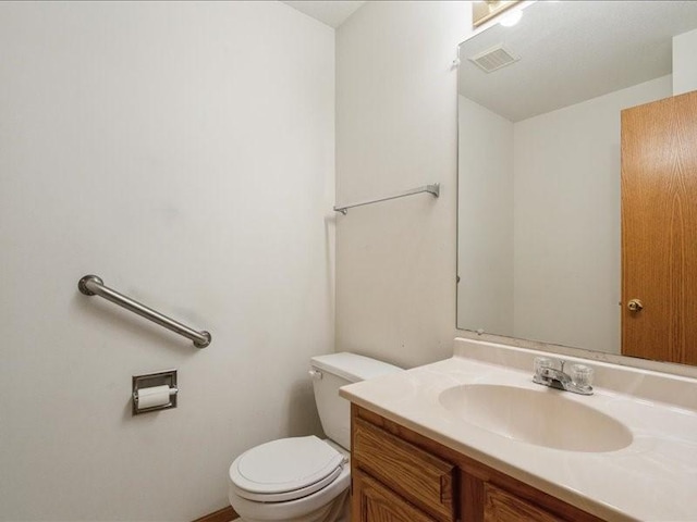 935 74th St NE Unit 5, Cedar Rapids, IA 52402 - half bathroom featuring toilet and vanity