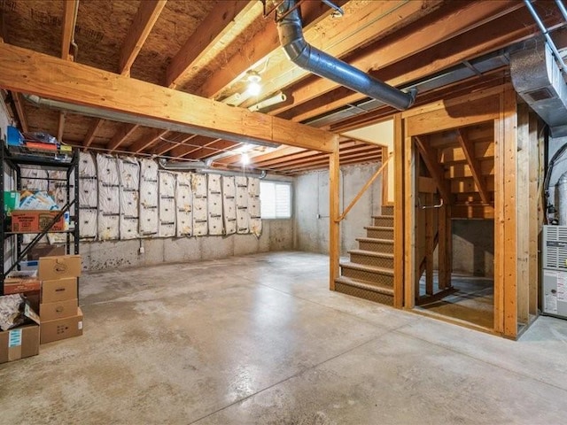 935 74th St NE Unit 5, Cedar Rapids, IA 52402 - below grade area featuring stairway