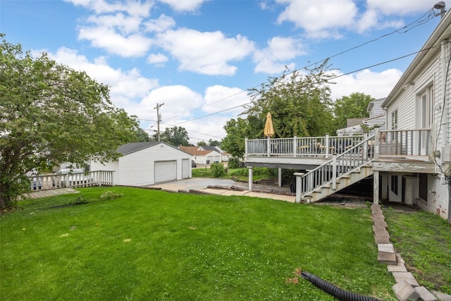 2518 1st Ave NE, Cedar Rapids, IA 52402 - view of yard featuring a deck, a garage, stairway, an outdoor structure, and driveway