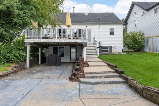 2518 1st Ave NE, Cedar Rapids, IA 52402 - back of property featuring a deck, stairway, roof with shingles, and driveway