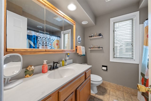 2518 1st Ave NE, Cedar Rapids, IA 52402 - bathroom with vanity, plenty of natural light, and a shower with shower curtain