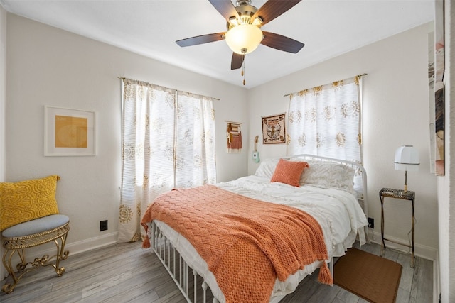 2518 1st Ave NE, Cedar Rapids, IA 52402 - bedroom with wood finished floors and ceiling fan