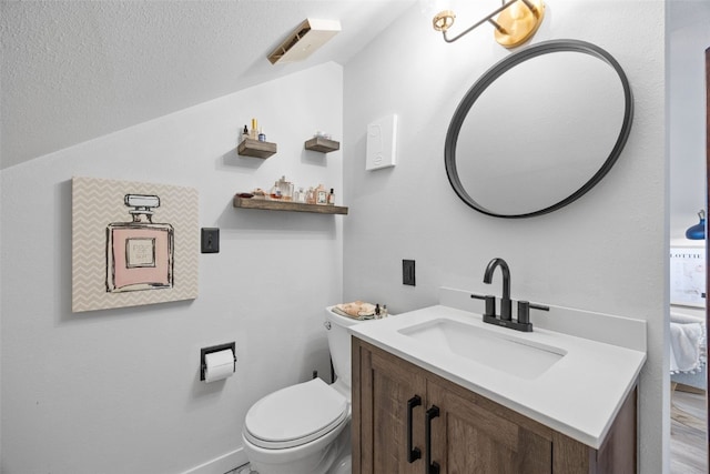 2518 1st Ave NE, Cedar Rapids, IA 52402 - half bath featuring vanity and a textured ceiling
