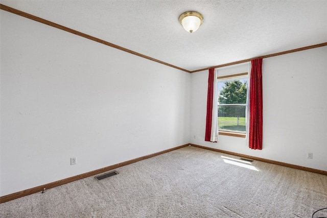204 Northgate St, Shellsburg, IA 52332 - carpeted spare room with crown molding and a textured ceiling