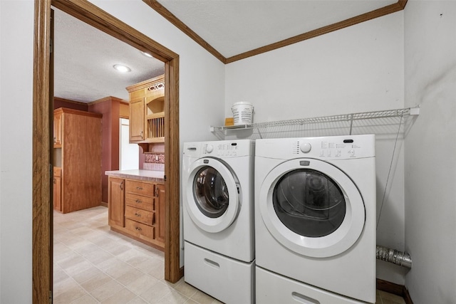 204 Northgate St, Shellsburg, IA 52332 - laundry area with ornamental molding, washer and clothes dryer, and recessed lighting