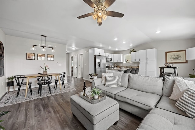 904 Hughes St, Coralville, IA 52241 - living area featuring vaulted ceiling, dark wood-style floors, ceiling fan, and recessed lighting